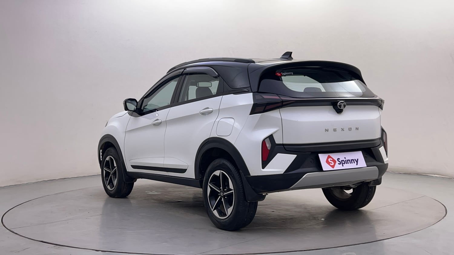 Used 2025 Tata Nexon Fearless Plus (PS) 1.2 Petrol DCA Dual Tone Petrol Automatic exterior LEFT REAR CORNER VIEW