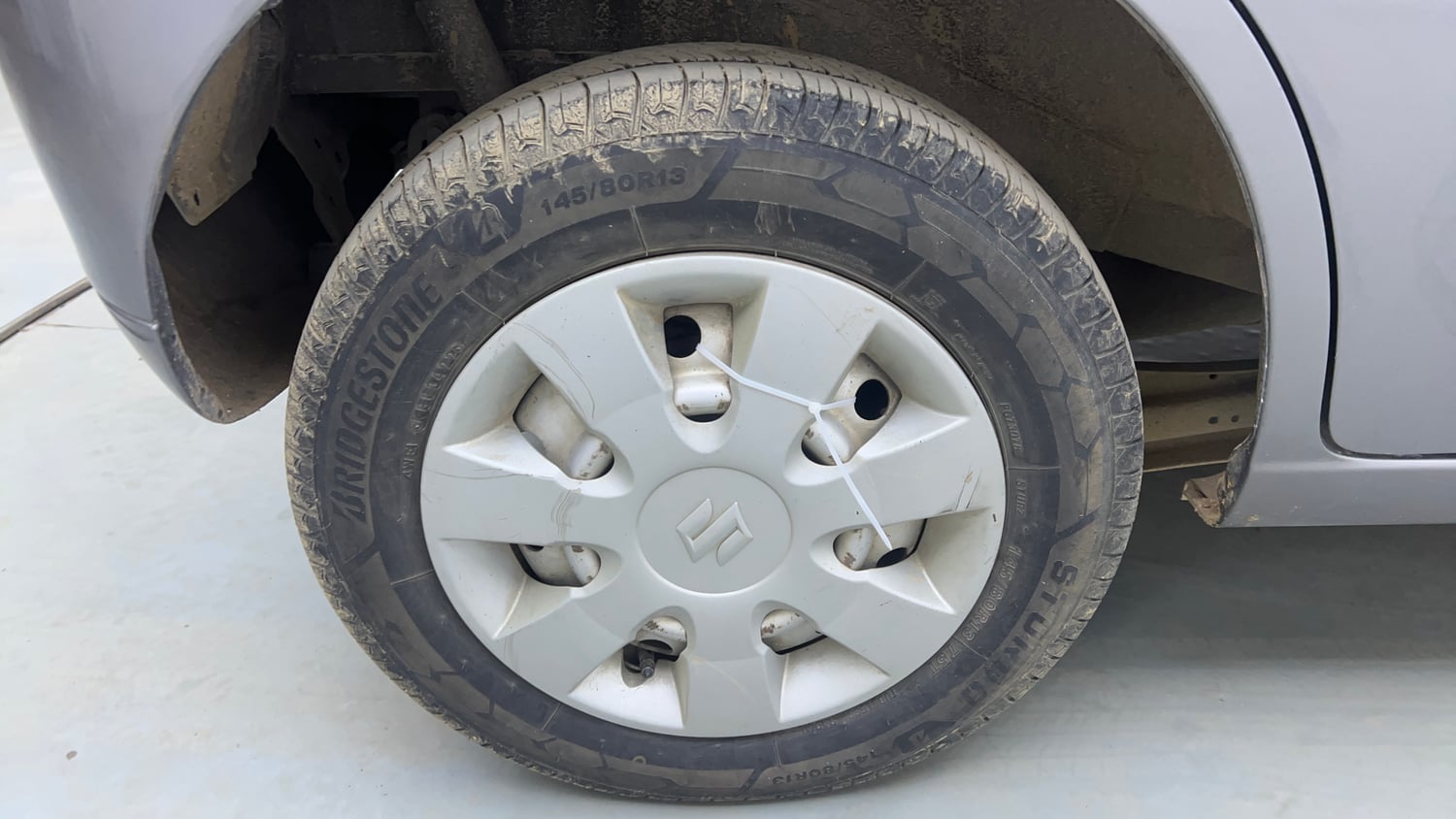 Used 2014 Maruti Suzuki Wagon R LXI Petrol Manual tyres RIGHT REAR TYRE RIM VIEW