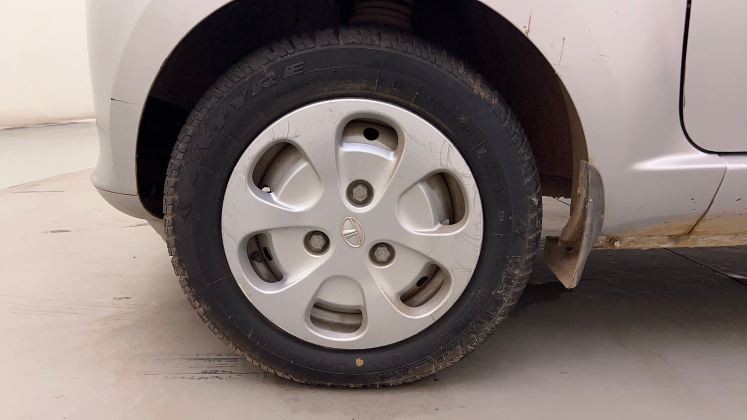 Used 2016 Tata Nano Twist XTA Petrol Automatic tyres LEFT FRONT TYRE RIM VIEW