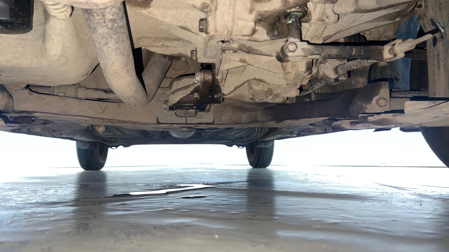 Used 2020 Maruti Suzuki Dzire VXi Petrol Manual extra FRONT LEFT UNDERBODY VIEW