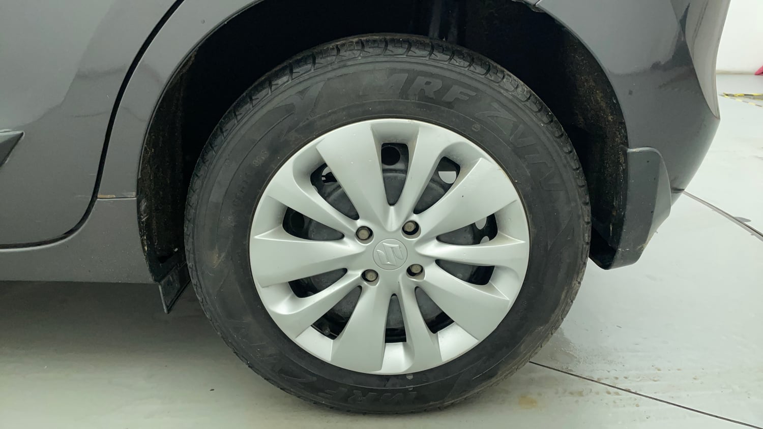Used 2016 Maruti Suzuki Baleno Delta 1.2 Petrol Manual tyres LEFT REAR TYRE RIM VIEW
