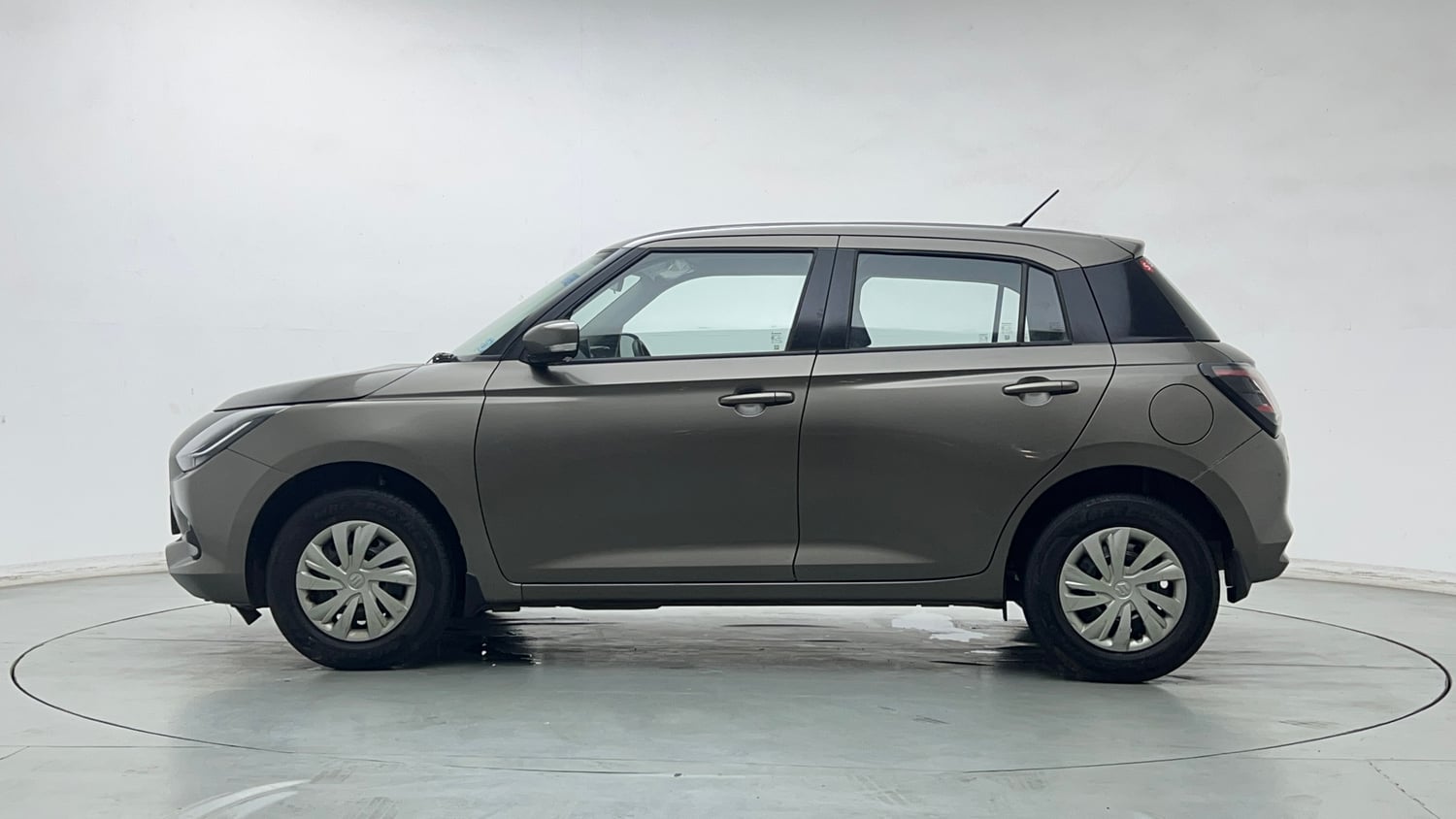 Used 2025 Maruti Suzuki Swift VXi Petrol Manual exterior LEFT SIDE VIEW