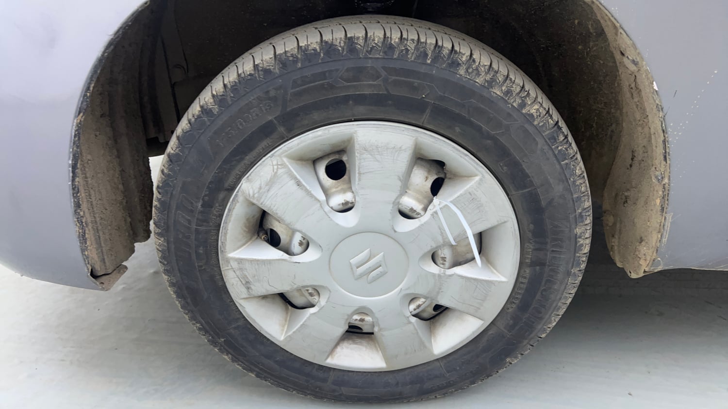 Used 2014 Maruti Suzuki Wagon R LXI Petrol Manual tyres LEFT FRONT TYRE RIM VIEW