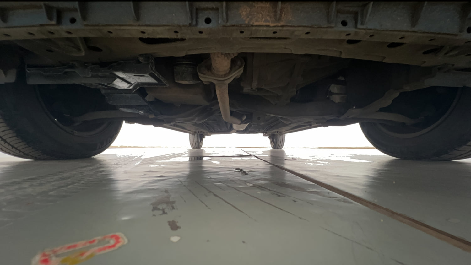 Used 2016 Maruti Suzuki Celerio VXi AMT Petrol Automatic extra FRONT LEFT UNDERBODY VIEW