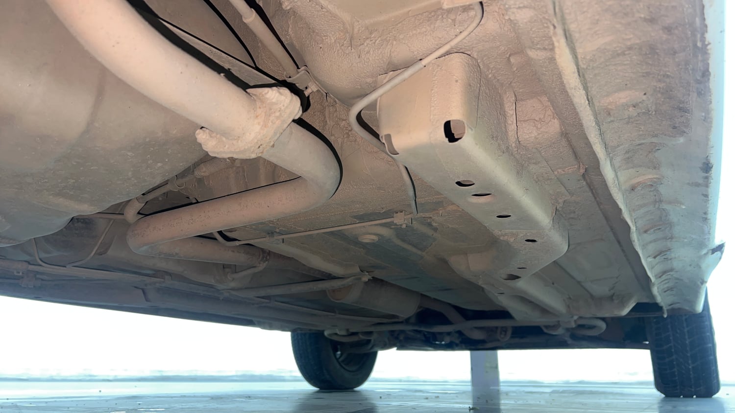 Used 2022 Tata Tigor XZ Plus CNG Cng Manual extra REAR RIGHT UNDERBODY VIEW