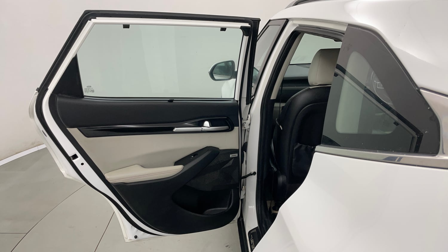 Used 2019 Kia Seltos GTX Plus 1.4 Petrol Manual interior LEFT REAR DOOR OPEN VIEW