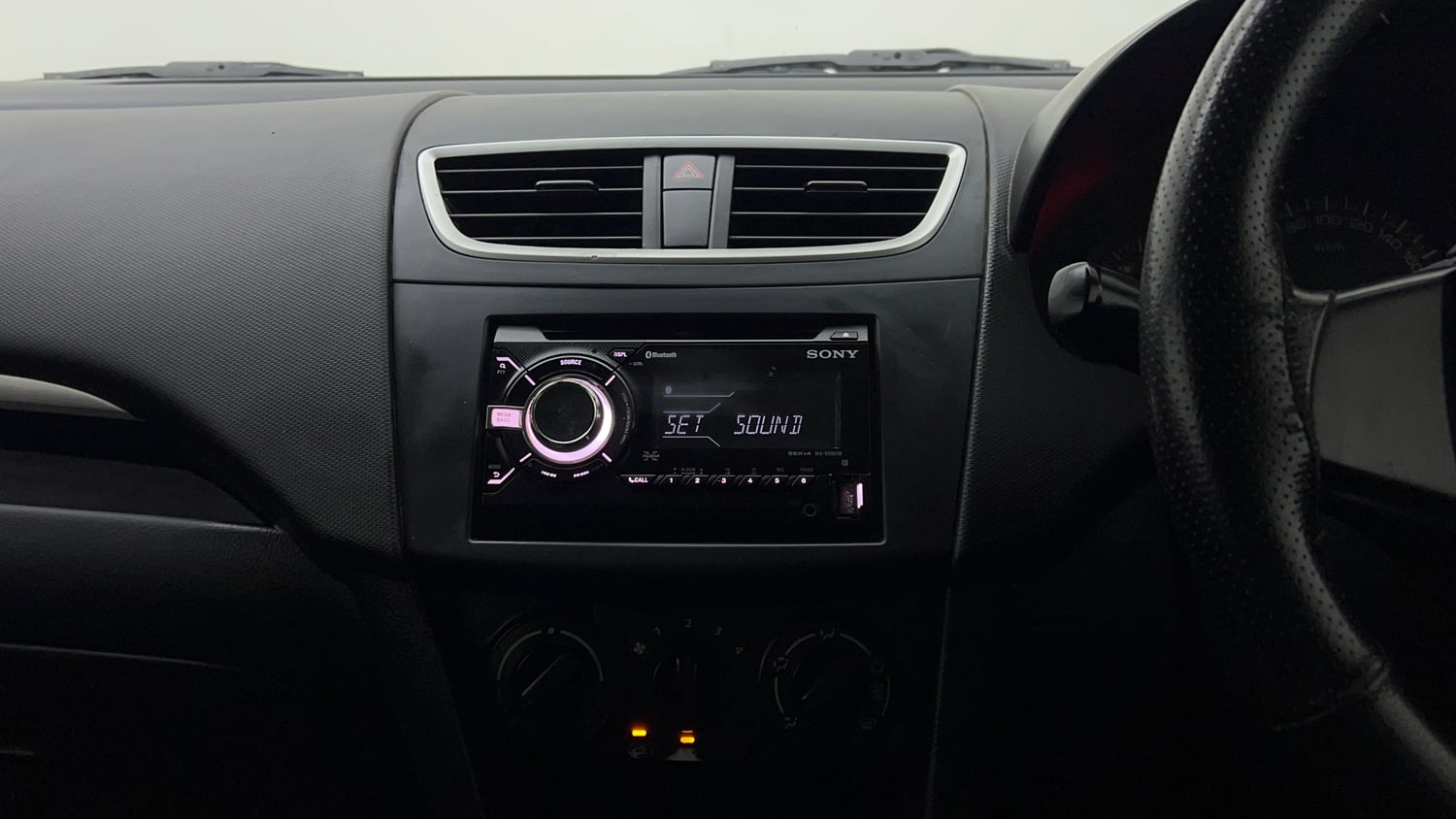 Used 2016 Maruti Suzuki Swift Lxi (O) Petrol Manual interior MUSIC SYSTEM & AC CONTROL VIEW