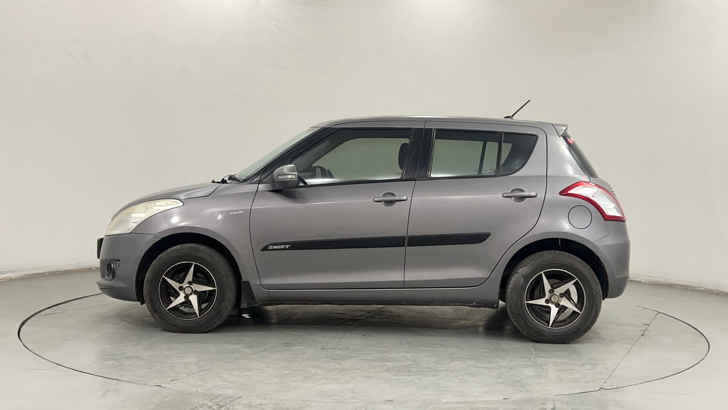 Used 2012 Maruti Suzuki Swift VXi Petrol Manual exterior LEFT SIDE VIEW