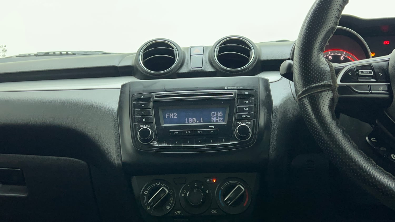 Used 2019 Maruti Suzuki Swift VXi Petrol Manual top_features Integrated (in-dash) music system