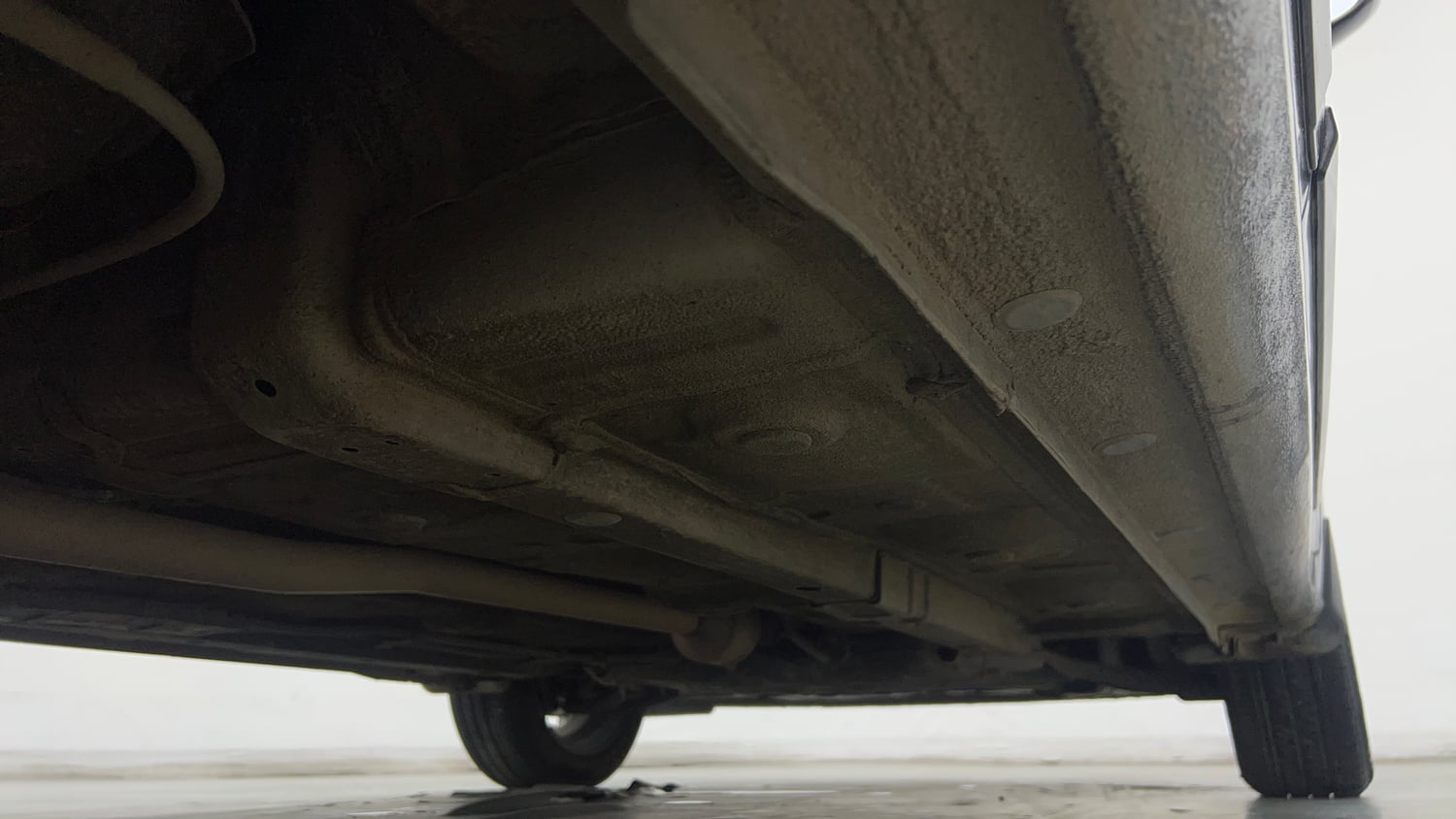 Used 2023 Hyundai Aura SX 1.2 CNG Cng Manual extra REAR RIGHT UNDERBODY VIEW