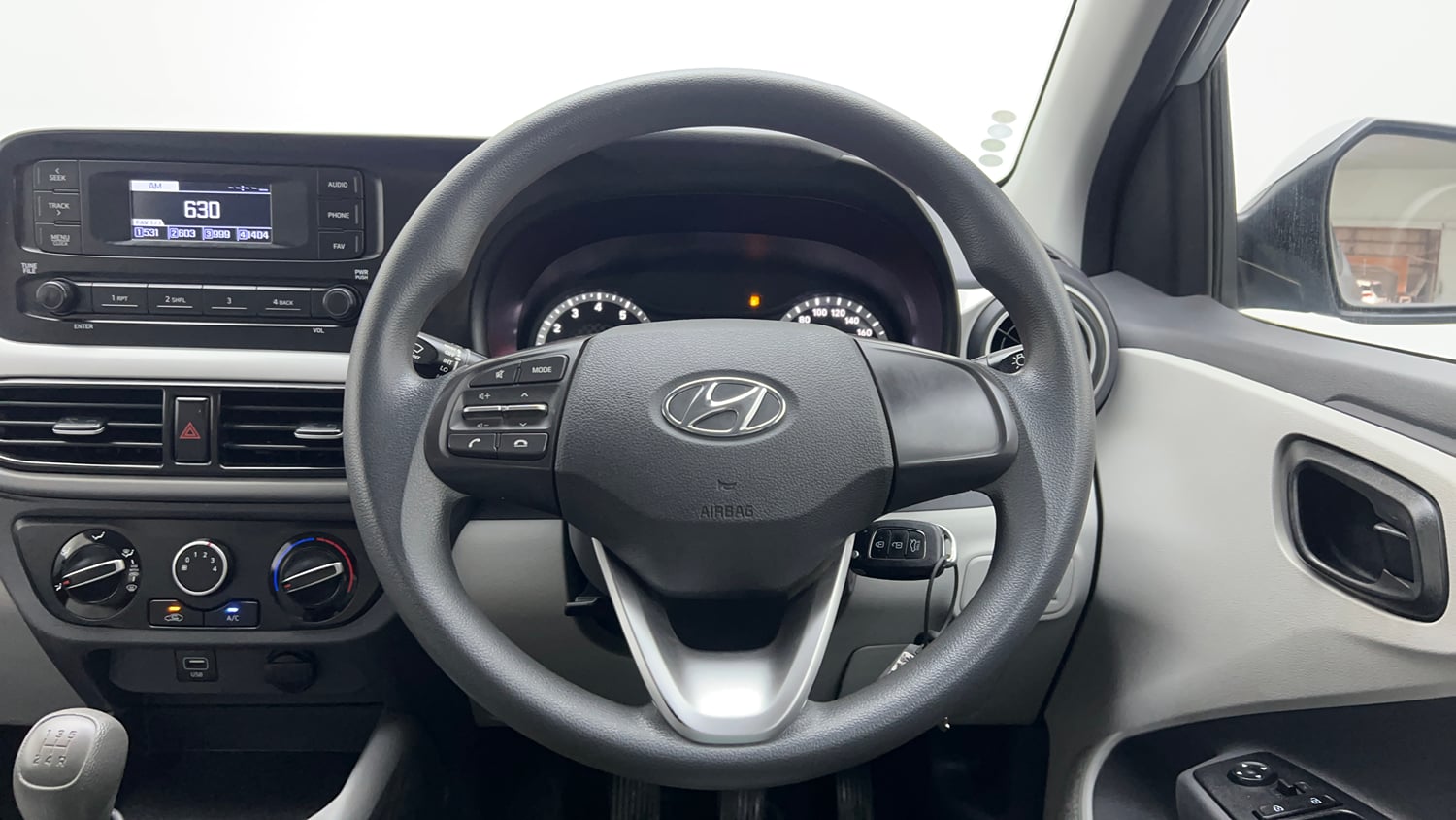 Used 2022 Hyundai Grand i10 Nios Magna 1.2 Kappa VTVT Petrol Manual interior STEERING VIEW