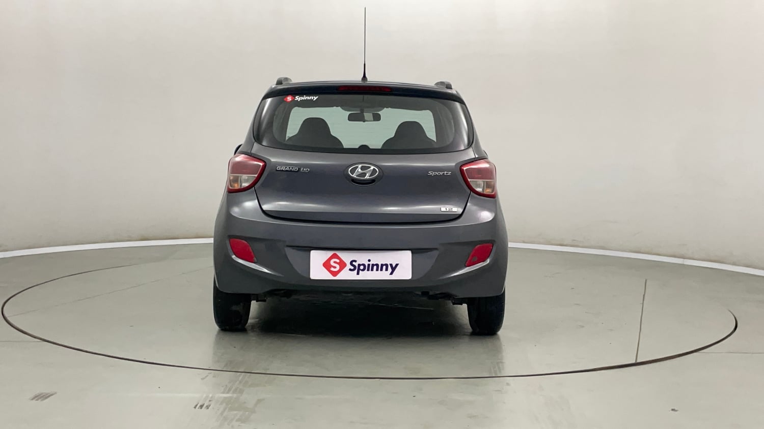 Used 2015 Hyundai Grand i10 Sportz 1.2 Kappa VTVT Petrol Manual exterior BACK VIEW