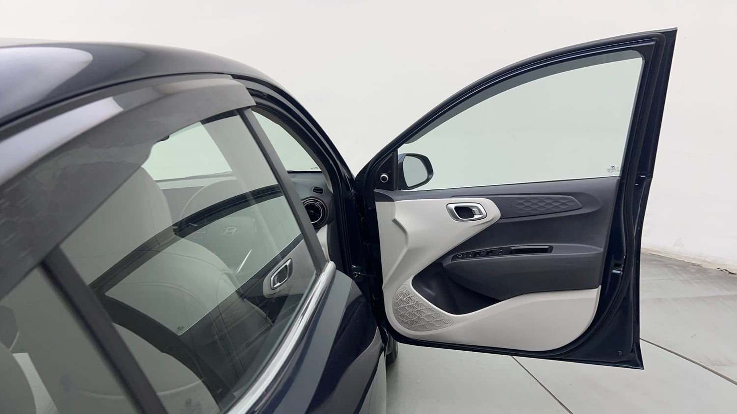 Used 2023 Hyundai Aura SX 1.2 CNG Cng Manual interior RIGHT FRONT DOOR OPEN VIEW