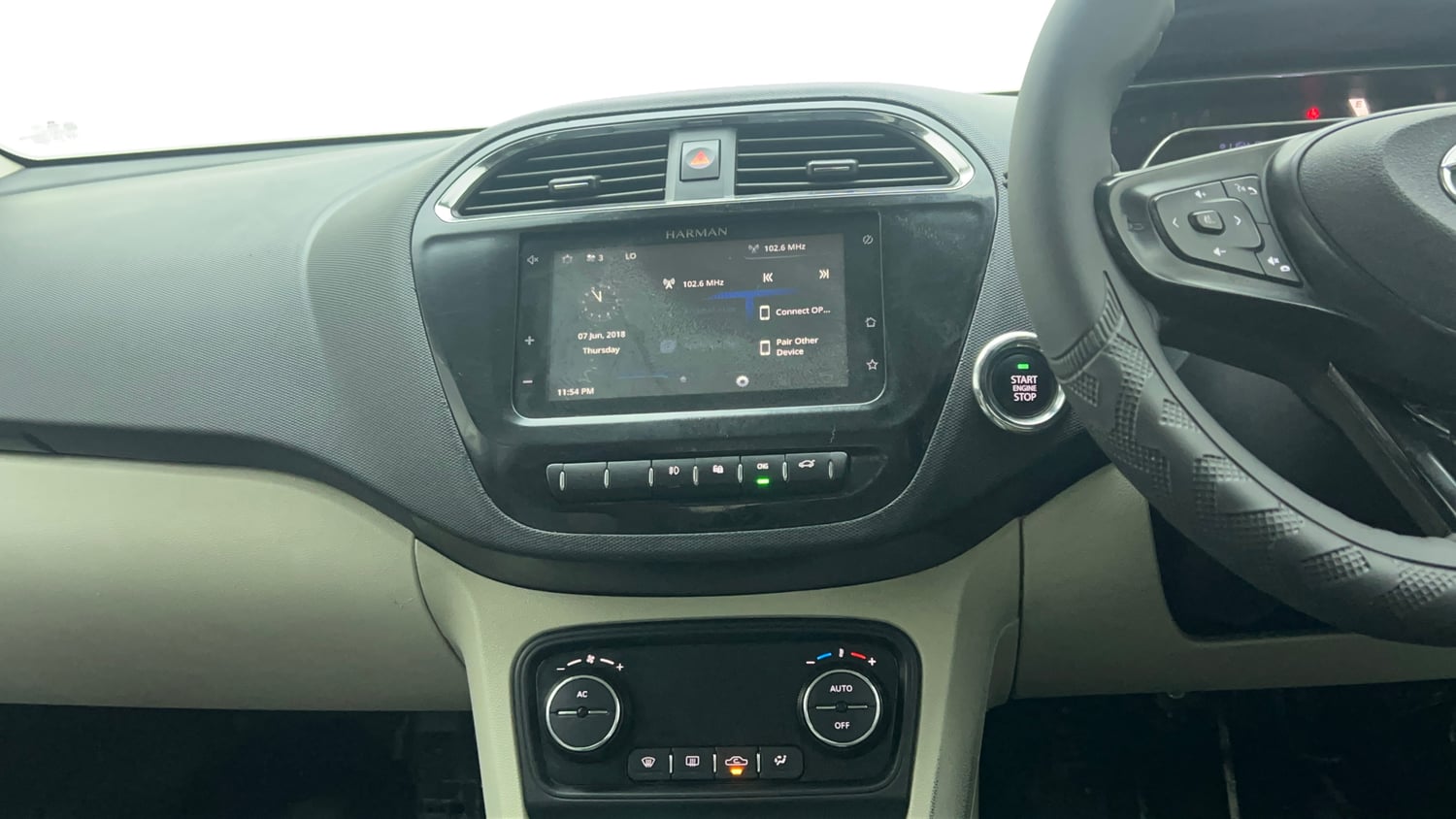 Used 2022 Tata Tigor XZ Plus CNG Cng Manual top_features Integrated (in-dash) music system