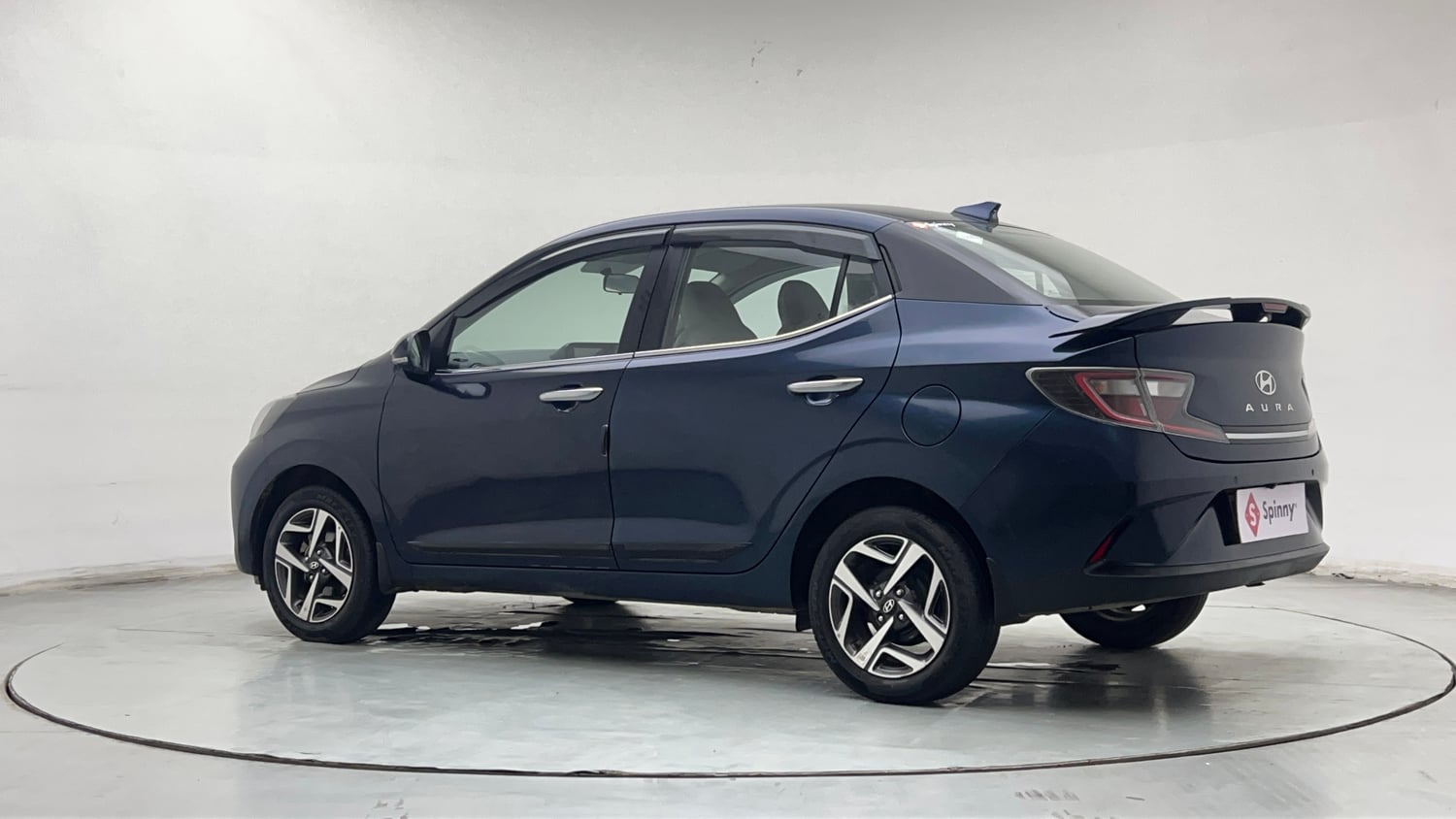 Used 2023 Hyundai Aura SX 1.2 CNG Cng Manual exterior LEFT REAR CORNER VIEW