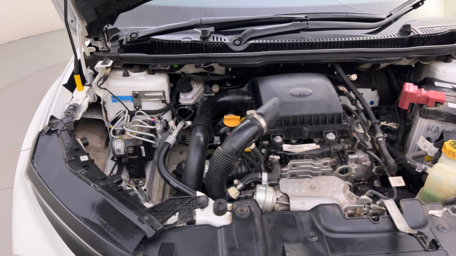 Used 2025 Tata Nexon Fearless Plus (PS) 1.2 Petrol DCA Dual Tone Petrol Automatic engine ENGINE RIGHT SIDE HINGE & APRON VIEW