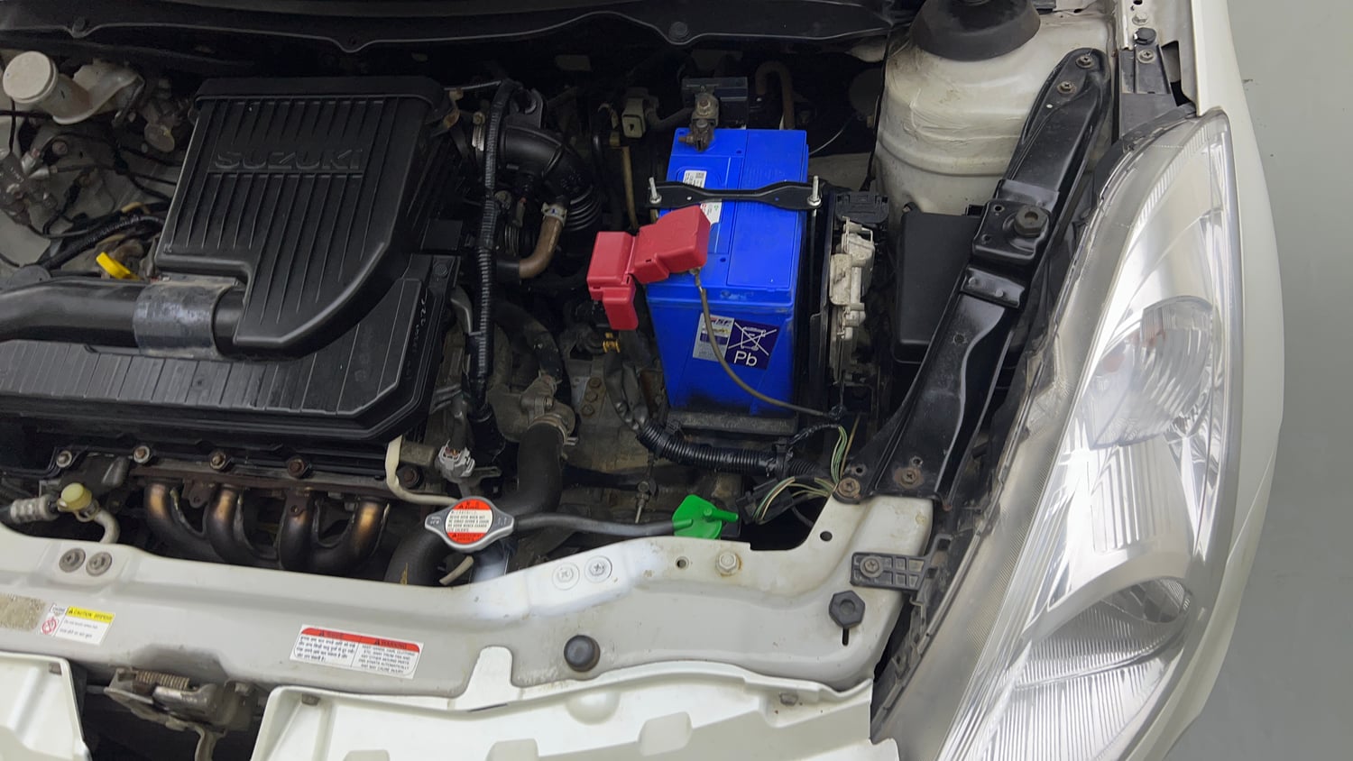 Used 2016 Maruti Suzuki Swift Lxi (O) Petrol Manual engine ENGINE LEFT SIDE VIEW