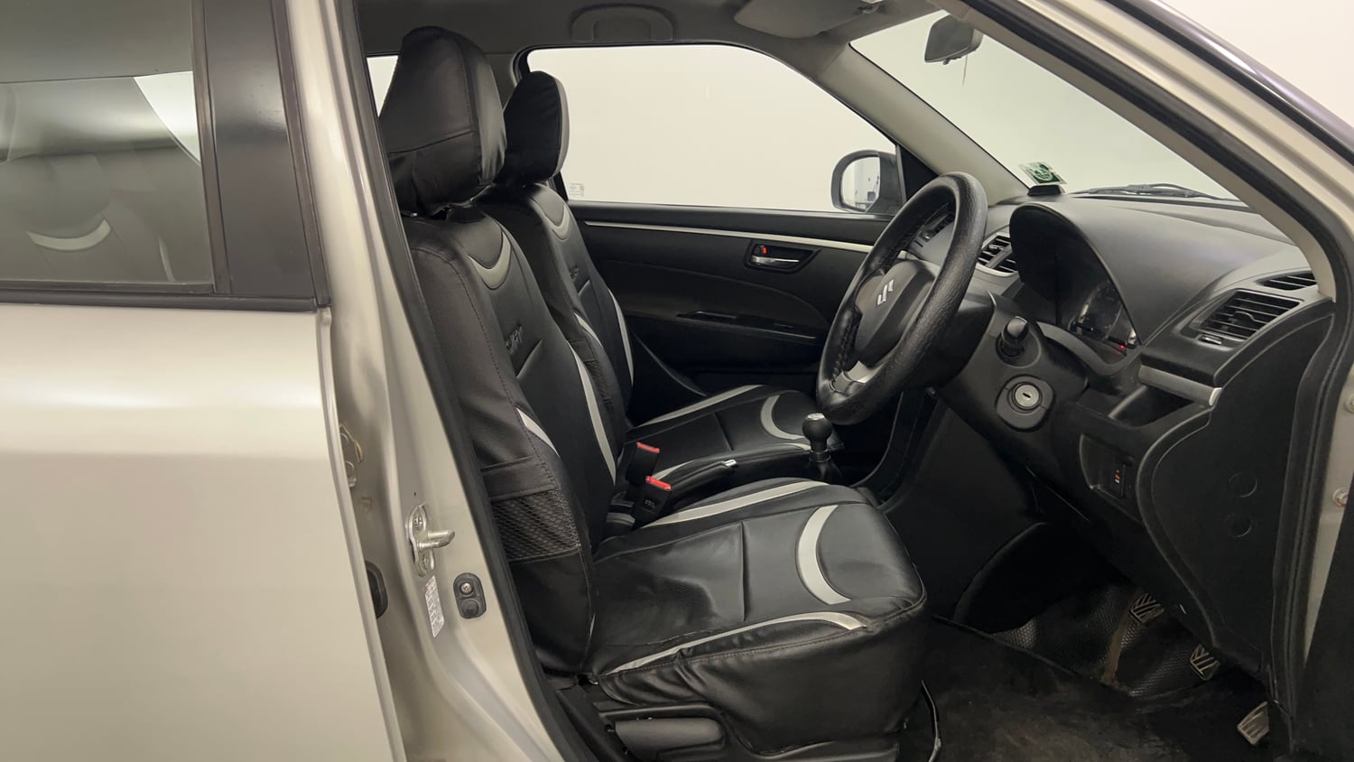 Used 2014 Maruti Suzuki Swift VXi Petrol Manual interior RIGHT SIDE FRONT DOOR CABIN VIEW