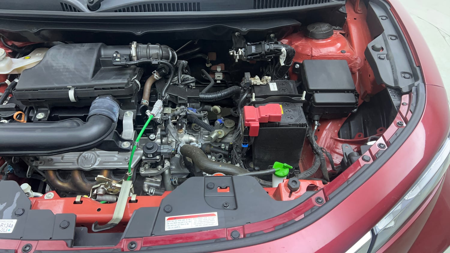 Used 2024 Maruti Suzuki Fronx Delta Plus (O) 1.2L MT Petrol Manual engine ENGINE LEFT SIDE VIEW
