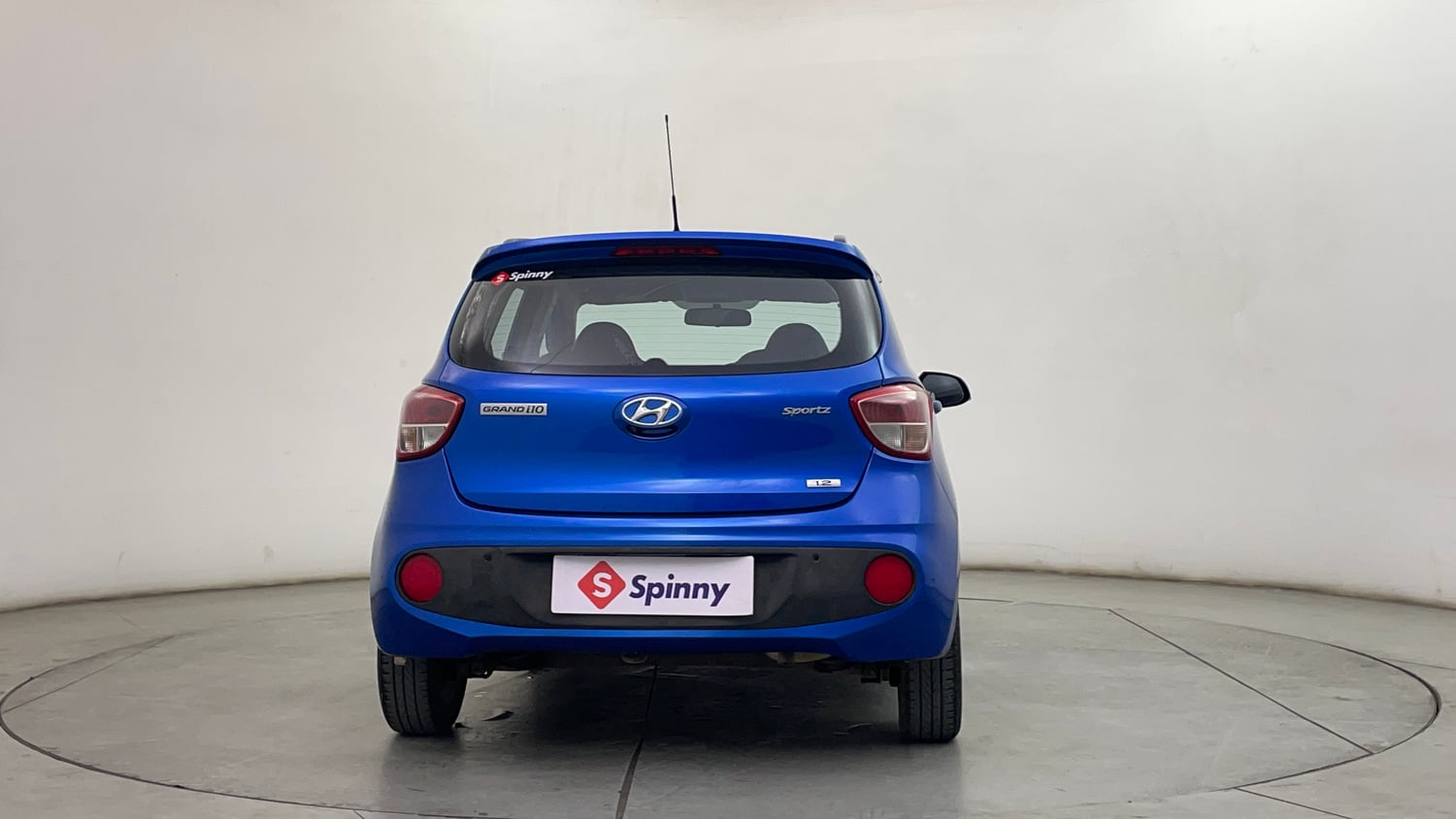 Used 2019 Hyundai Grand i10 Sportz AT 1.2 Kappa VTVT Petrol Automatic exterior BACK VIEW