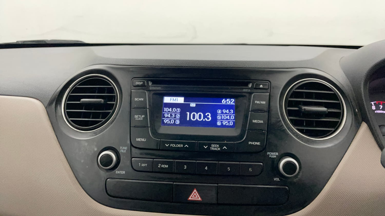 Used 2015 Hyundai Grand i10 Sportz 1.2 Kappa VTVT Petrol Manual interior MUSIC SYSTEM & AC CONTROL VIEW