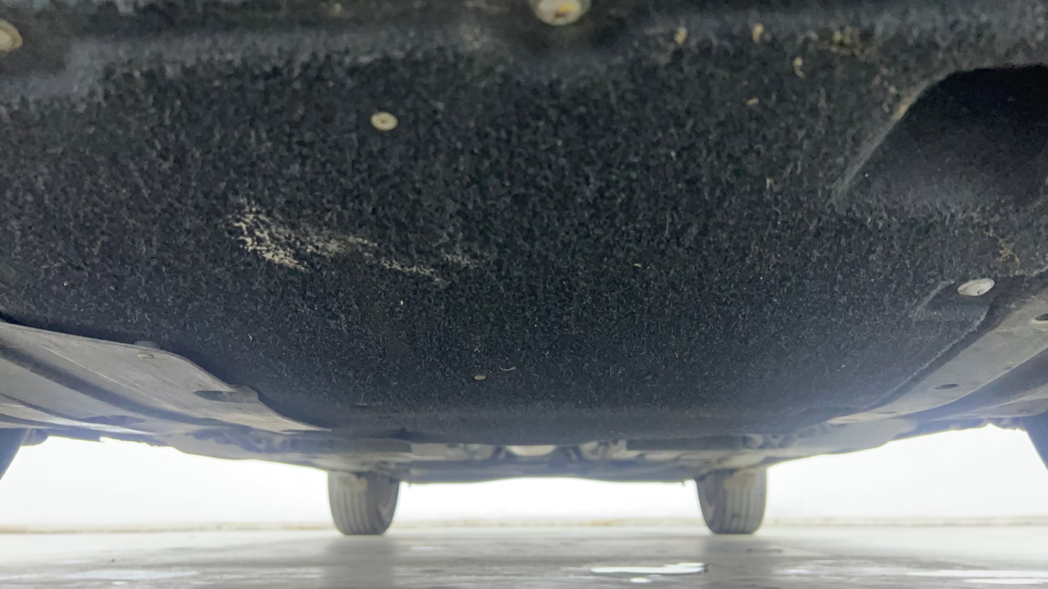Used 2024 Maruti Suzuki Baleno Alpha MT Petrol Manual extra FRONT LEFT UNDERBODY VIEW