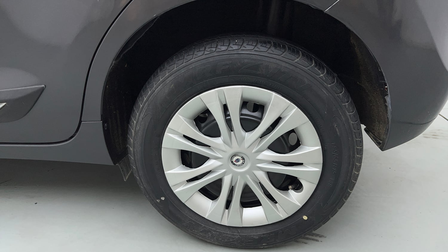 Used 2018 Maruti Suzuki Baleno Delta 1.2 Petrol Manual tyres LEFT REAR TYRE RIM VIEW