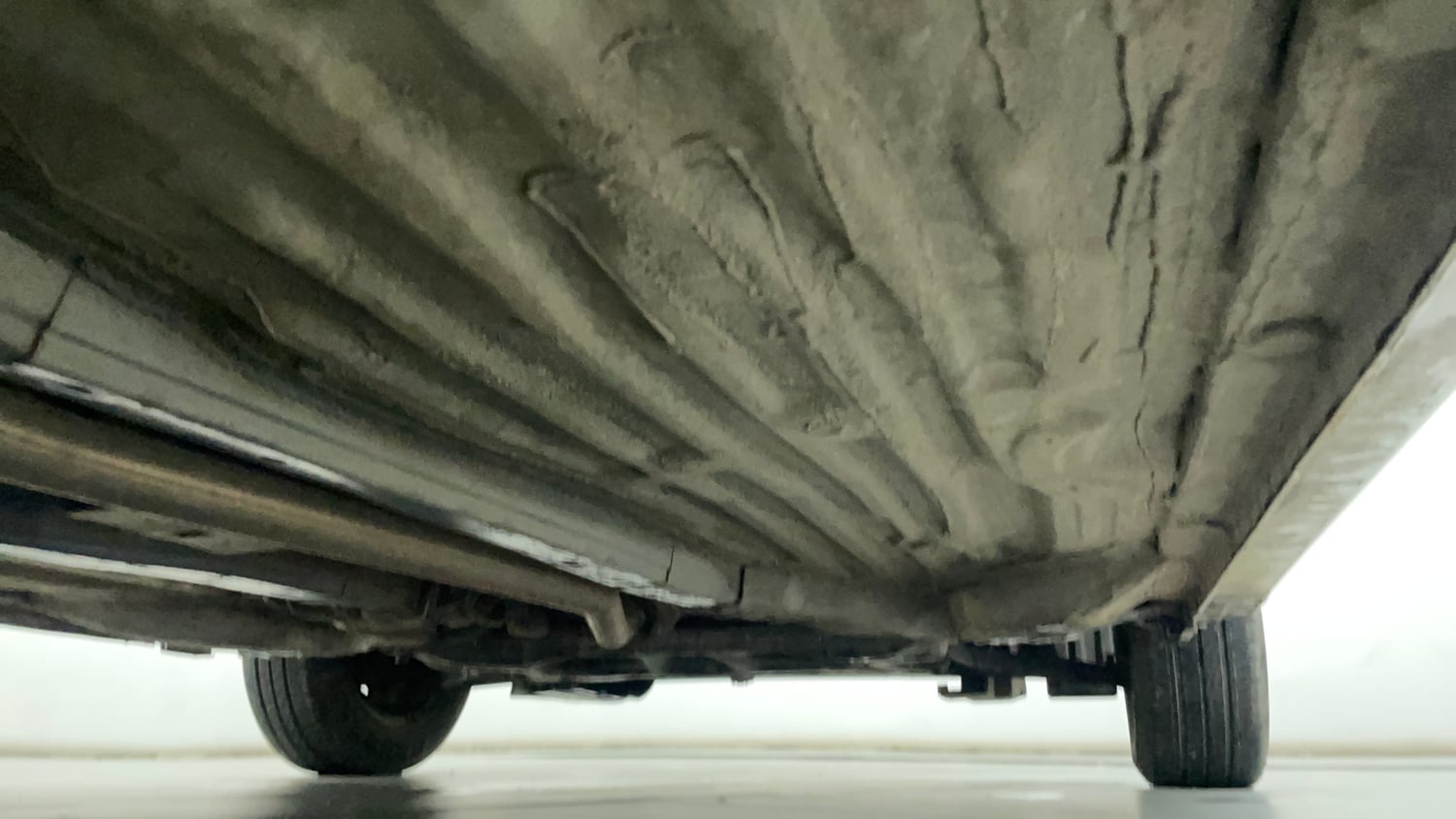 Used 2018 Honda Amaze 1.2 S MT Petrol Petrol Manual extra REAR RIGHT UNDERBODY VIEW