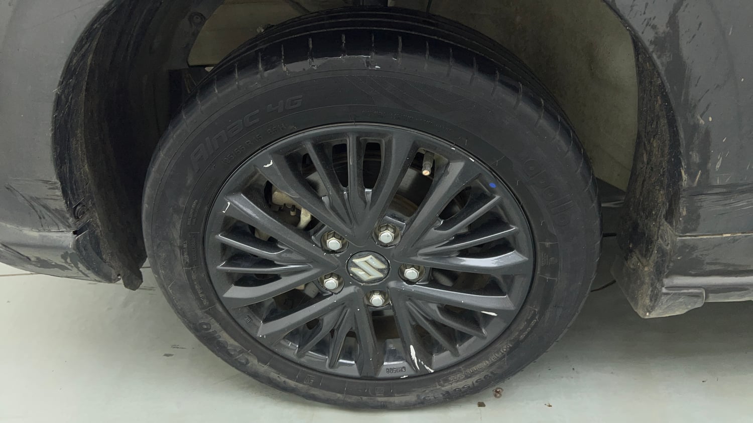 Used 2021 Maruti Suzuki XL6 Zeta MT Petrol Petrol Manual tyres LEFT FRONT TYRE RIM VIEW