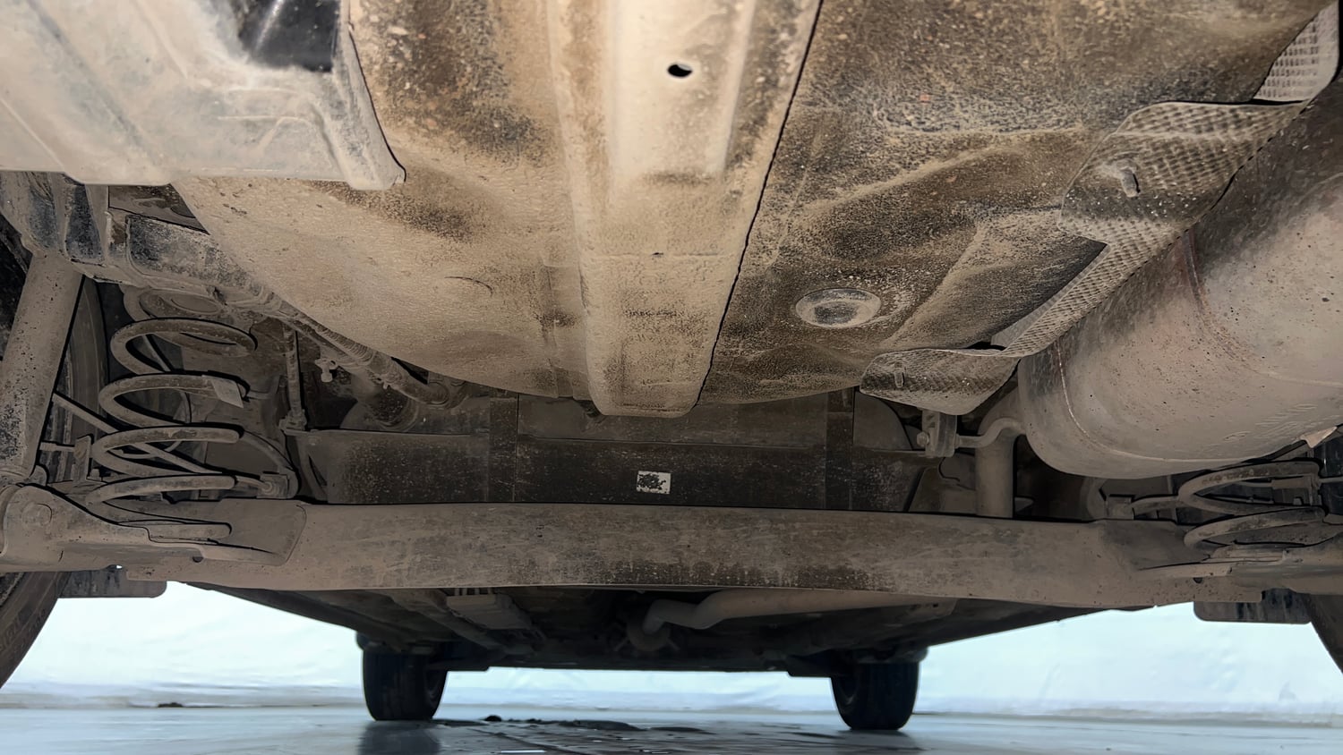 Used 2023 Hyundai Aura SX 1.2 CNG Cng Manual extra REAR UNDERBODY VIEW (TAKEN FROM REAR)