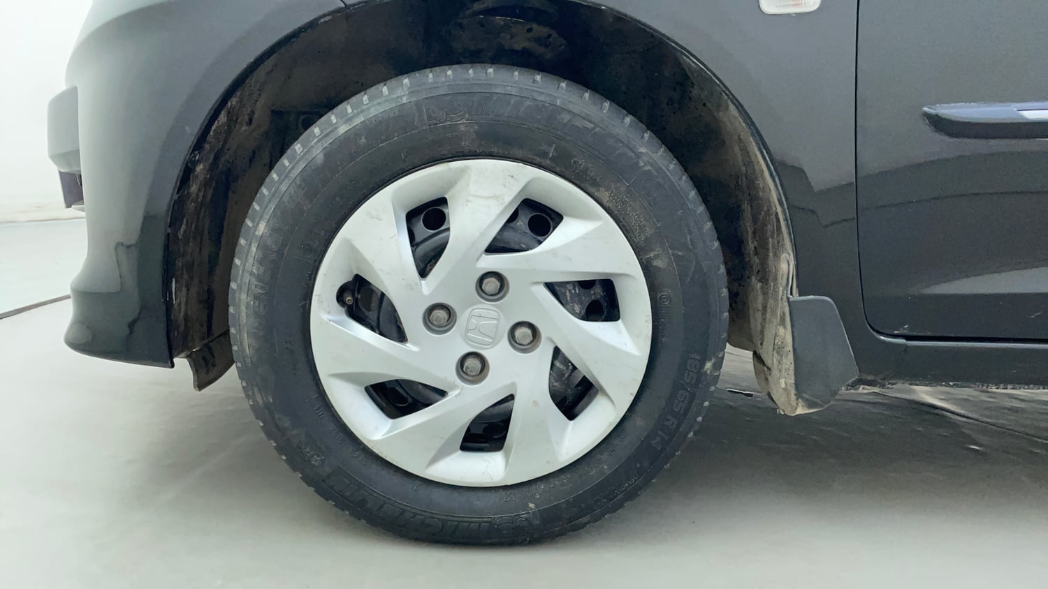 Used 2014 Honda Amaze 1.5 S i-DTEC Diesel Manual tyres LEFT FRONT TYRE RIM VIEW