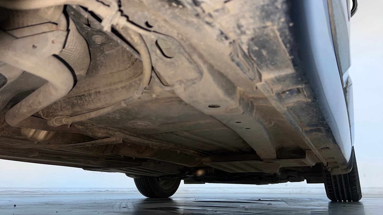 Used 2022 Toyota Glanza V AMT Petrol Automatic extra REAR RIGHT UNDERBODY VIEW
