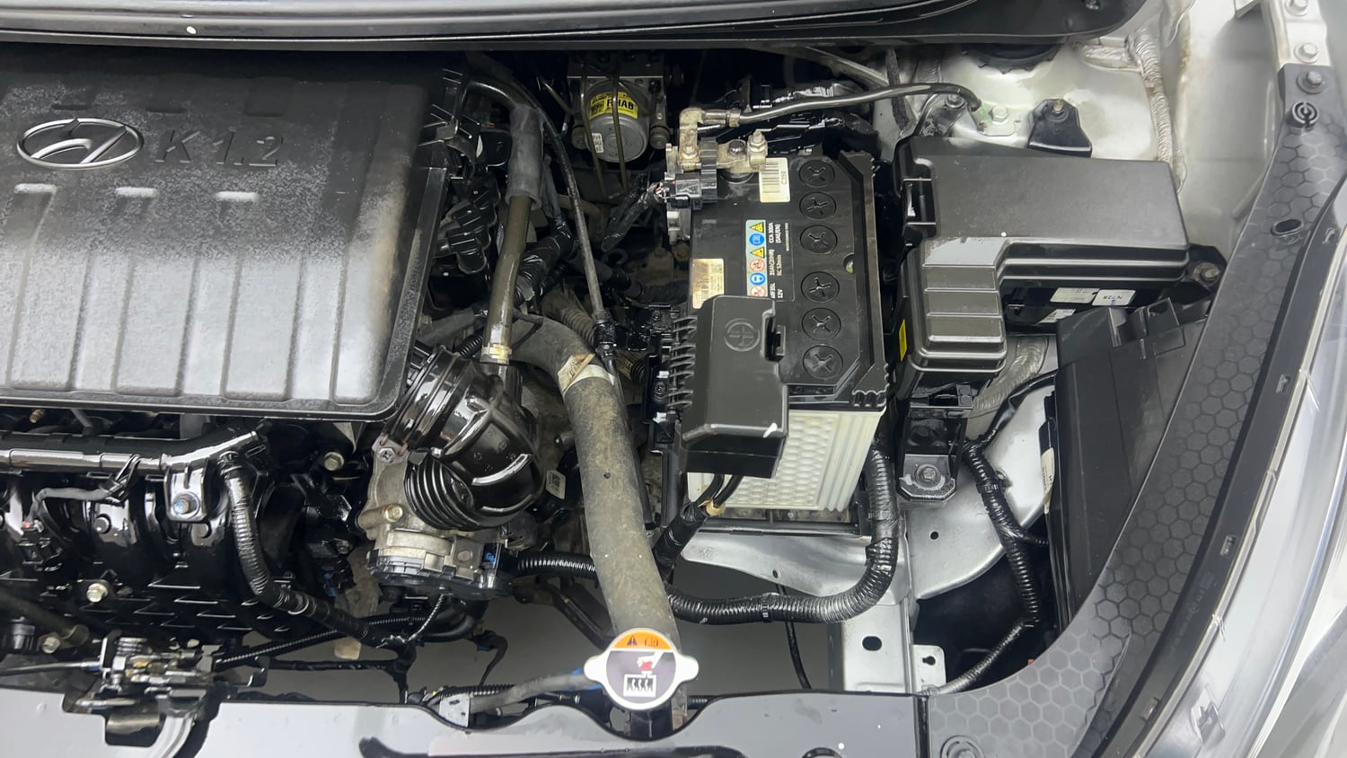 Used 2022 Hyundai Grand i10 Nios Magna 1.2 Kappa VTVT Petrol Manual engine ENGINE LEFT SIDE VIEW