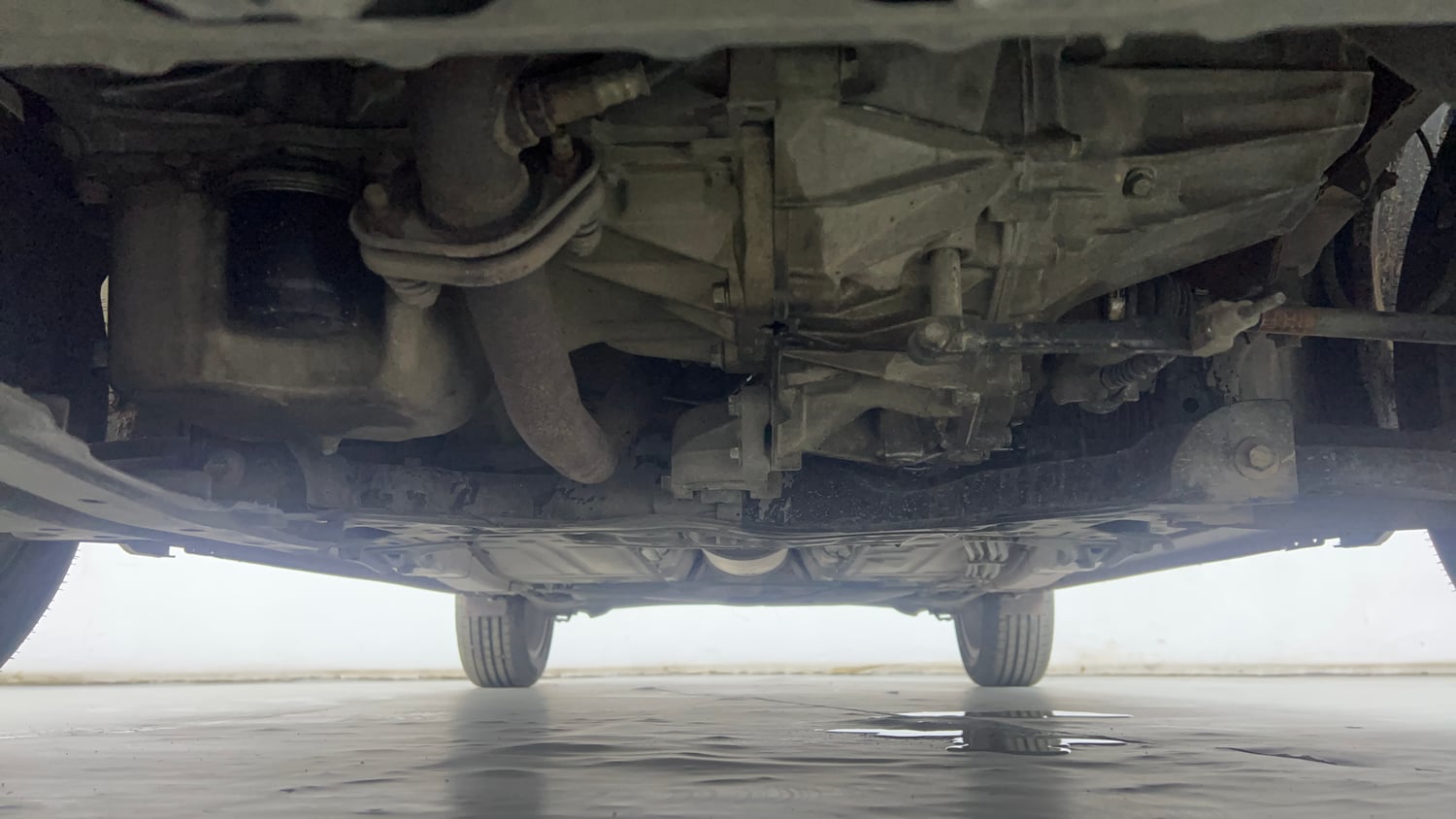 Used 2022 Maruti Suzuki Baleno Zeta Petrol Manual extra FRONT LEFT UNDERBODY VIEW