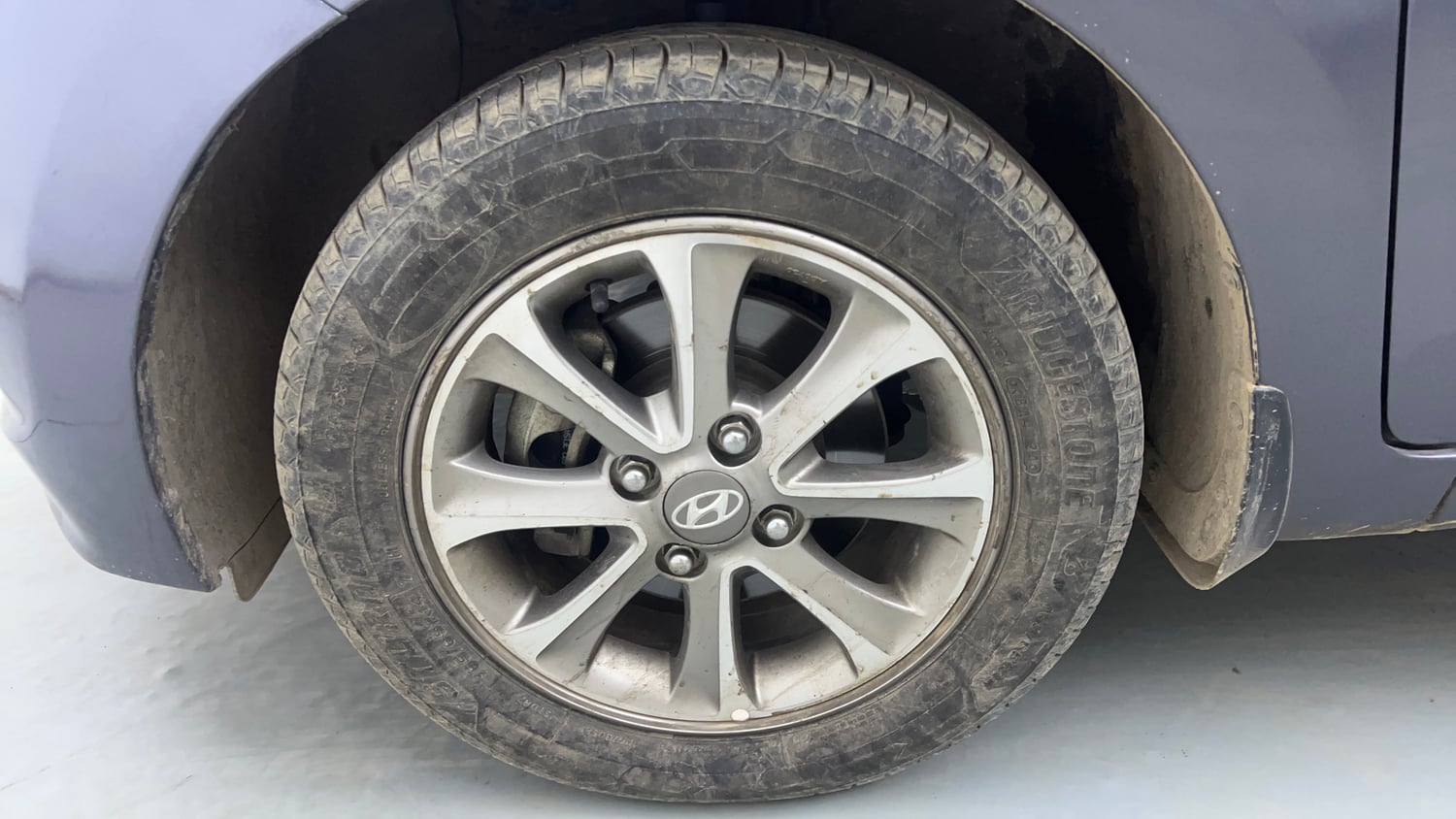 Used 2015 Hyundai Grand i10 Asta 1.2 Kappa VTVT Petrol Manual tyres LEFT FRONT TYRE RIM VIEW