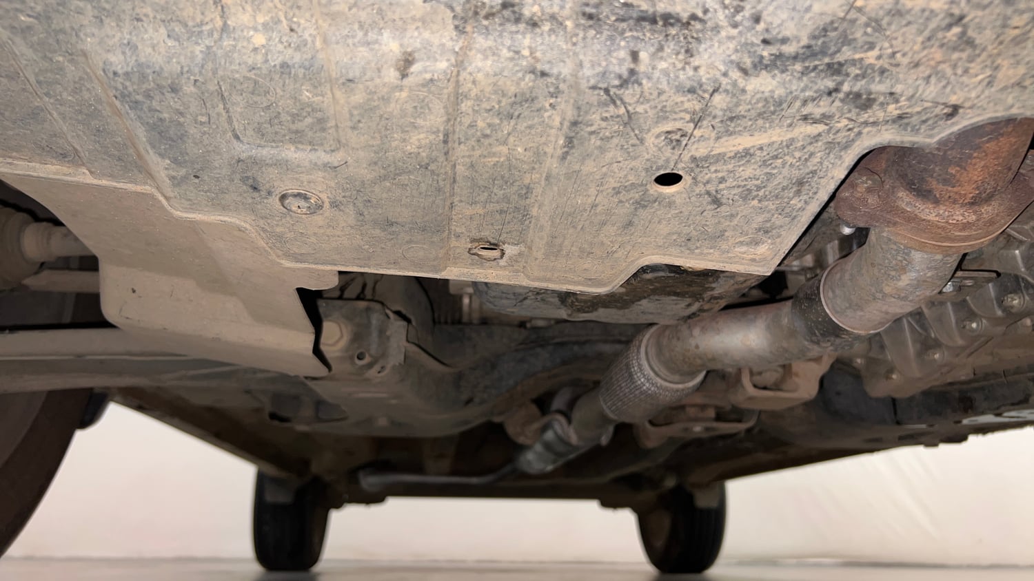 Used 2025 Tata Nexon Fearless Plus (PS) 1.2 Petrol DCA Dual Tone Petrol Automatic extra FRONT LEFT UNDERBODY VIEW