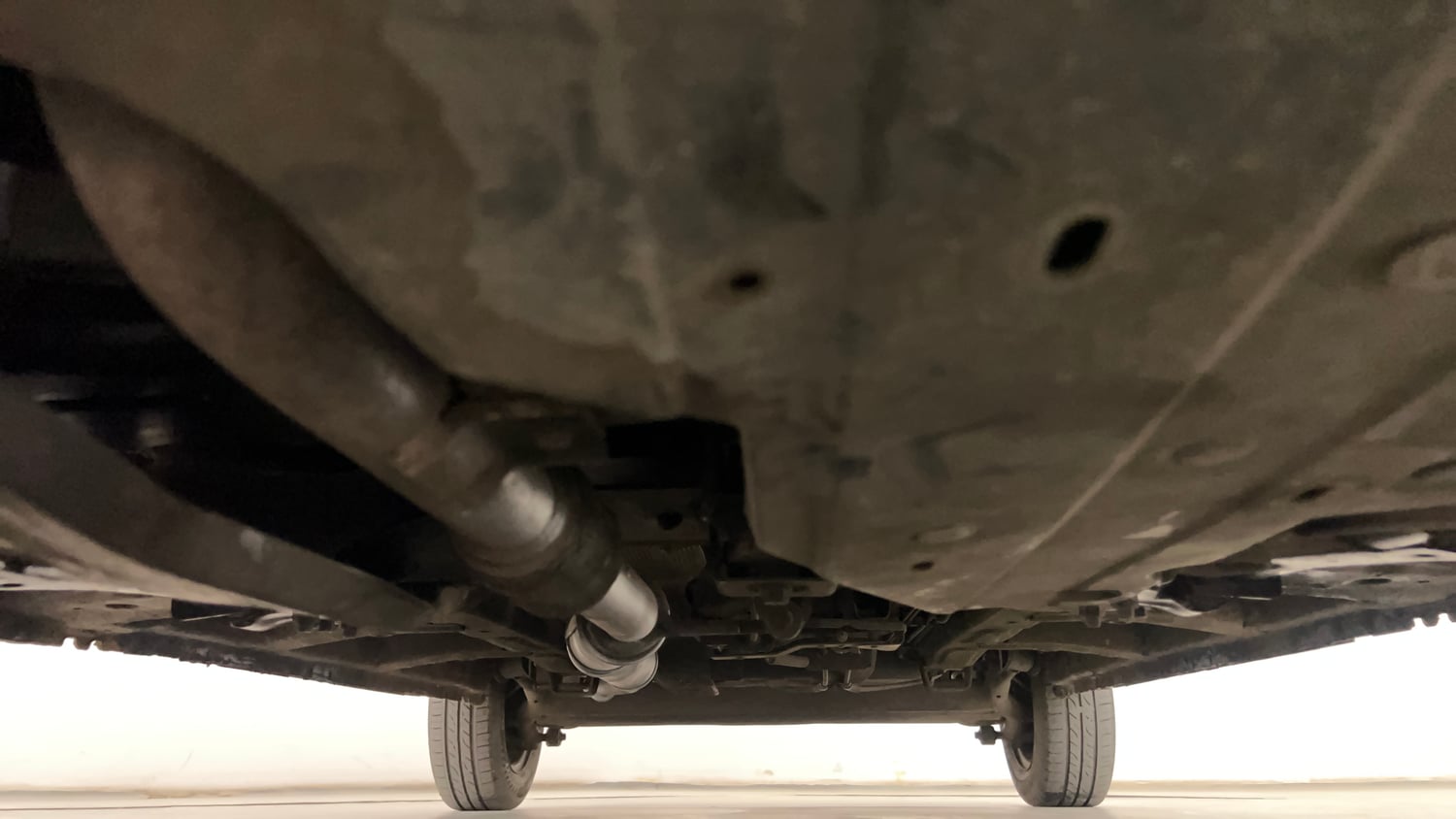 Used 2016 Mahindra KUV100 K4 5 STR Petrol Manual extra FRONT LEFT UNDERBODY VIEW