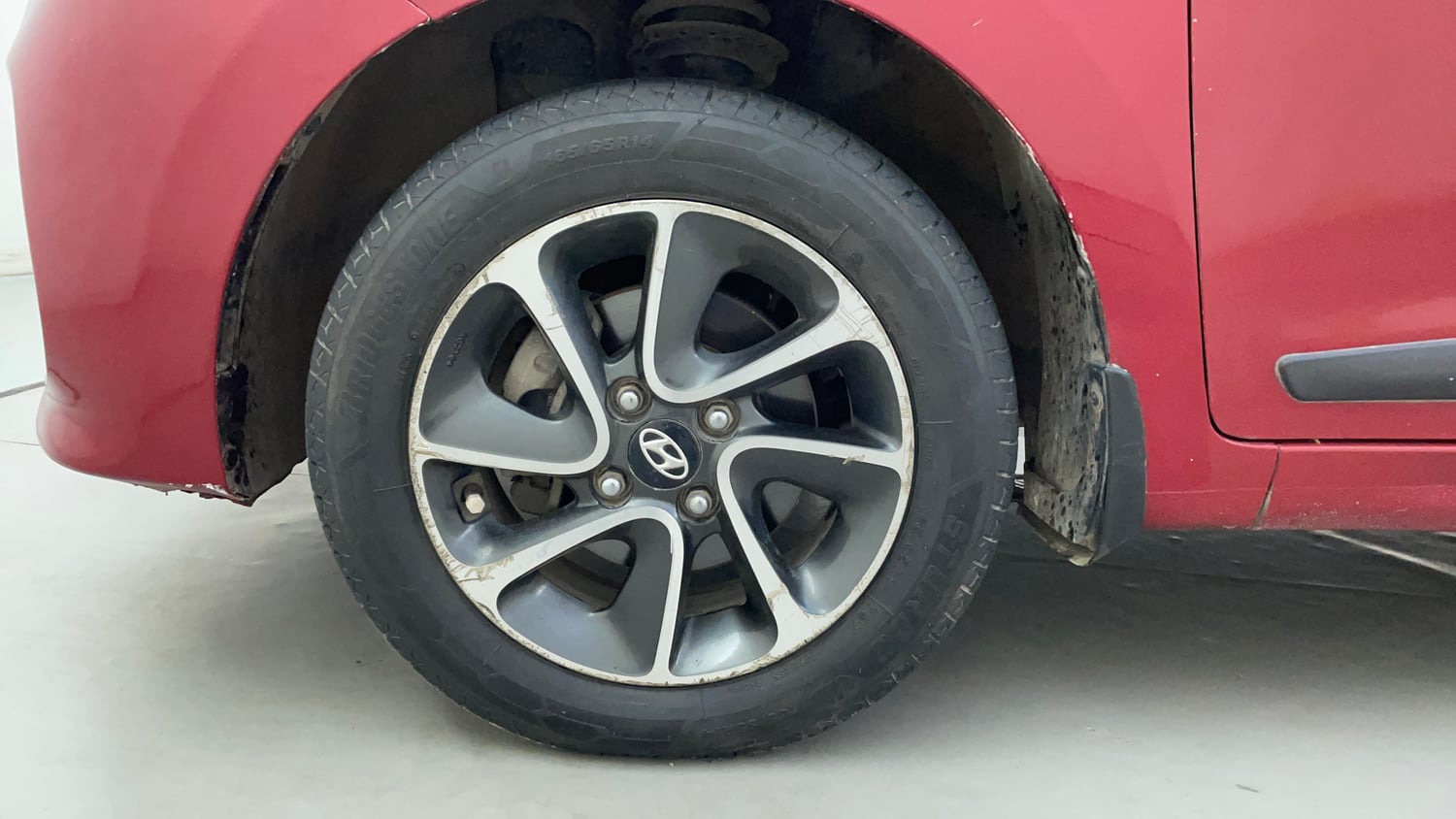Used 2018 Hyundai Grand i10 Sportz AT 1.2 Kappa VTVT Petrol Automatic tyres LEFT FRONT TYRE RIM VIEW