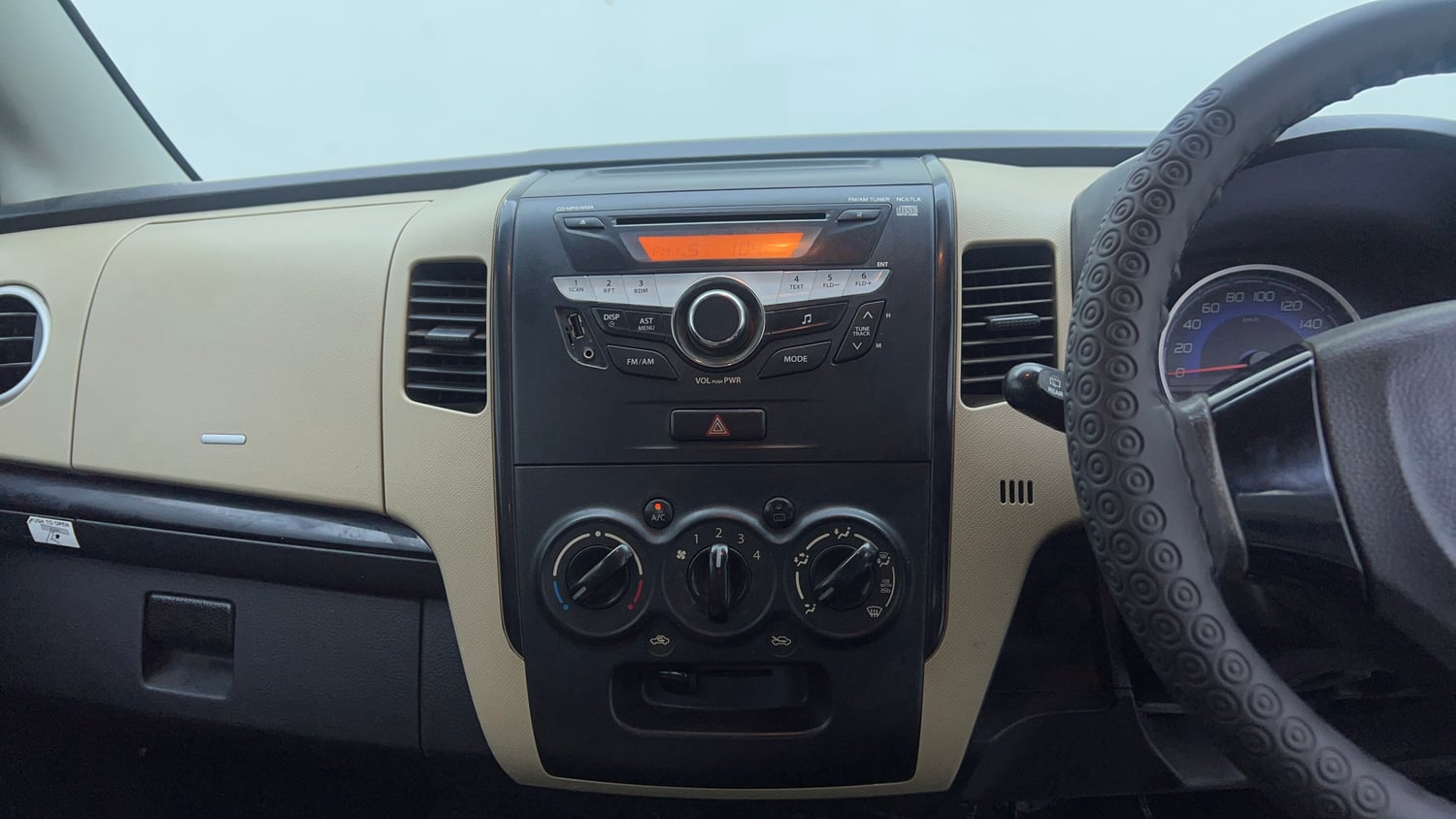 Used 2017 Maruti Suzuki Wagon R VXI+ Petrol Manual top_features Integrated (in-dash) music system
