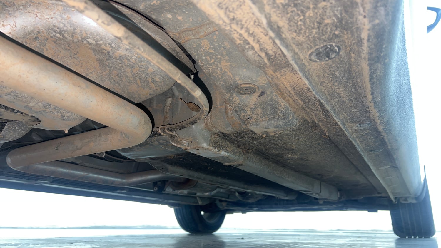 Used 2024 Hyundai Verna SX 1.5 Petrol MT Petrol Manual extra REAR RIGHT UNDERBODY VIEW