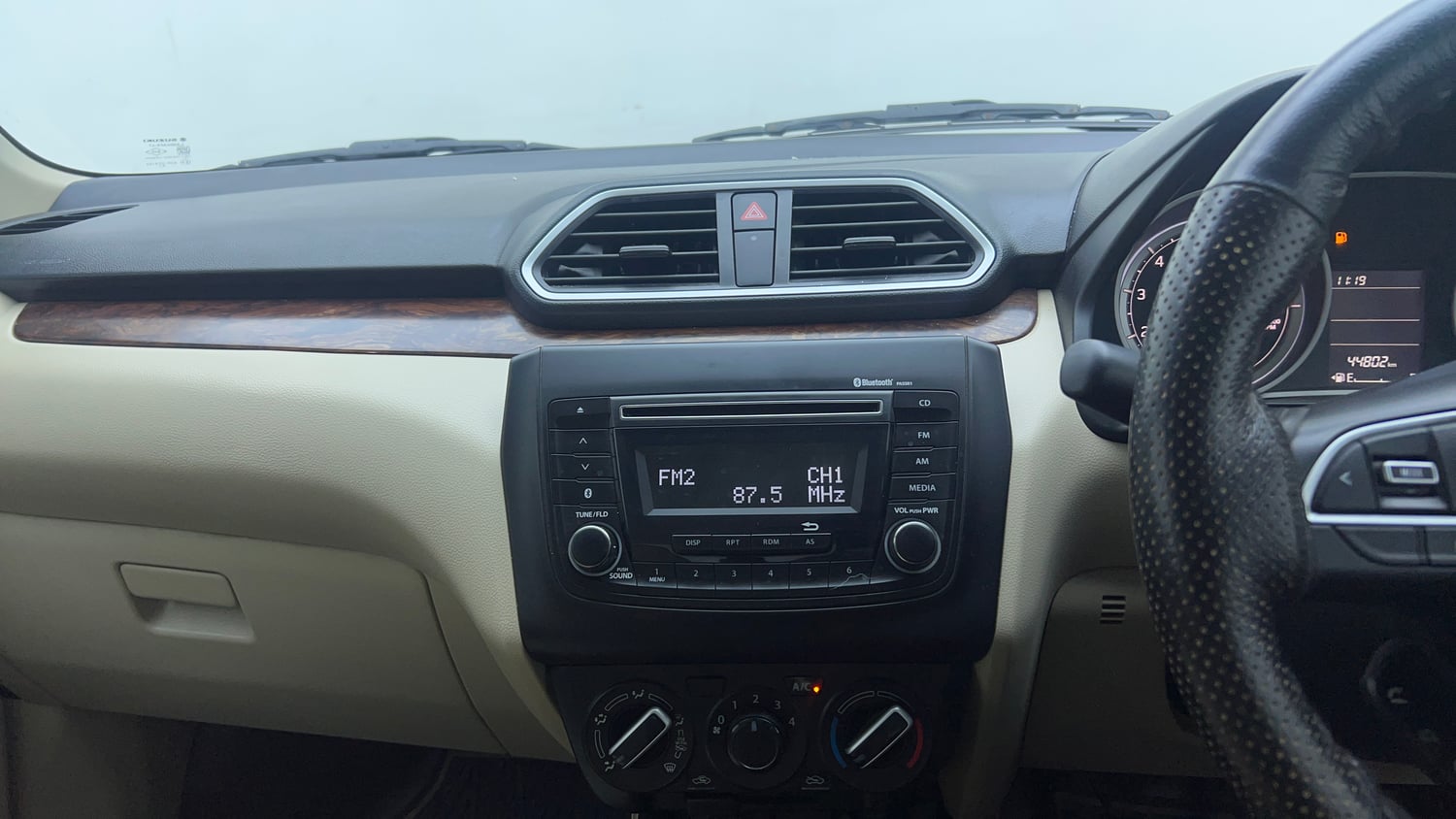 Used 2020 Maruti Suzuki Dzire VXi Petrol Manual top_features Integrated (in-dash) music system