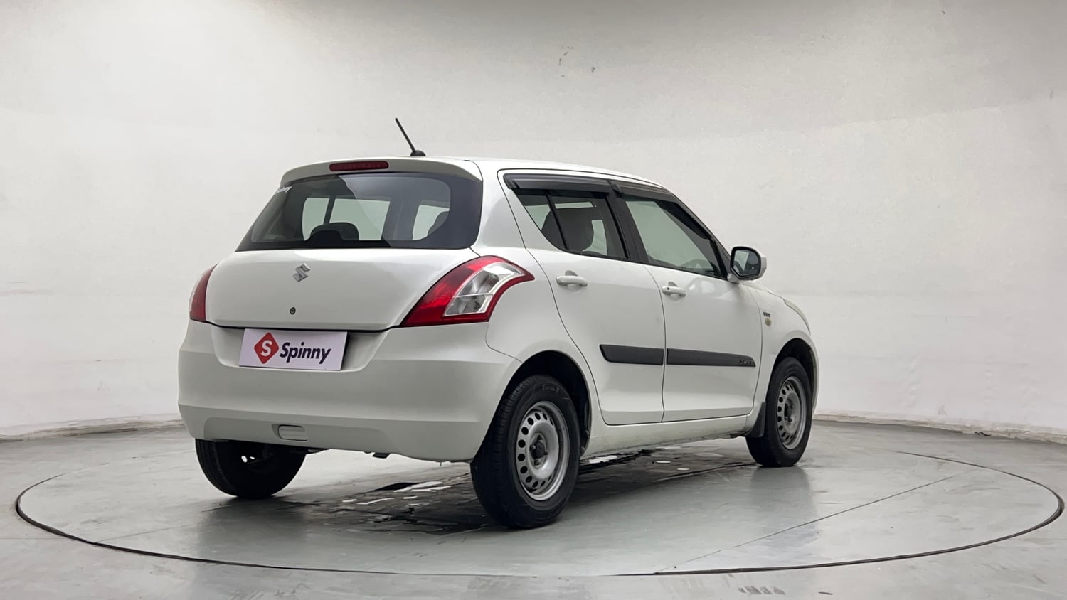 Used 2016 Maruti Suzuki Swift Lxi (O) Petrol Manual exterior RIGHT REAR CORNER VIEW