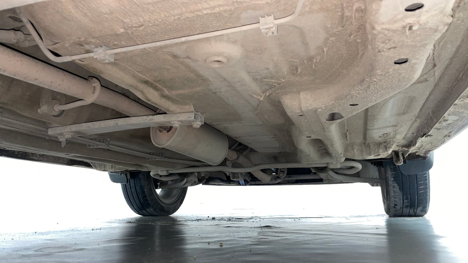 Used 2018 Tata Tigor Revotron XZ (O) Petrol Manual extra REAR RIGHT UNDERBODY VIEW