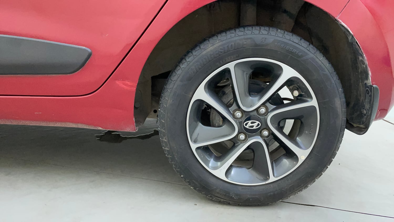 Used 2018 Hyundai Grand i10 Sportz AT 1.2 Kappa VTVT Petrol Automatic tyres LEFT REAR TYRE RIM VIEW
