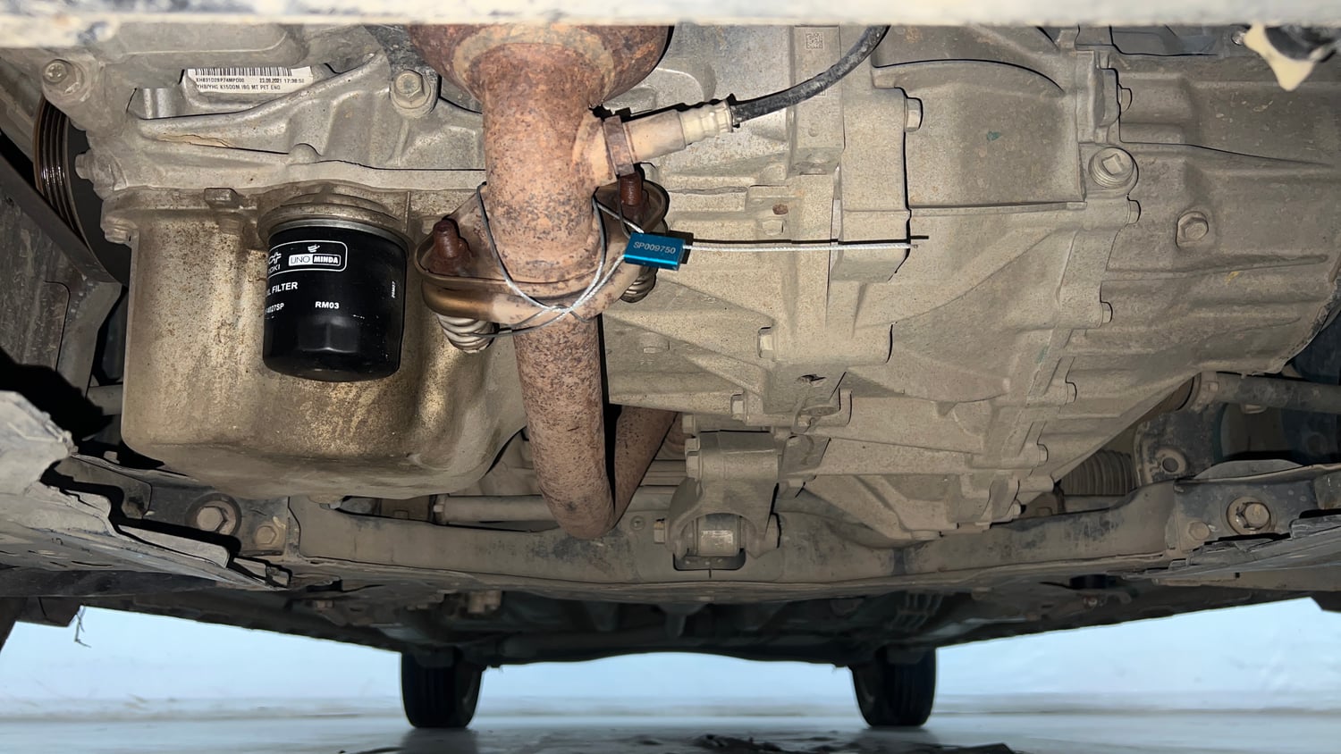 Used 2021 Maruti Suzuki XL6 Zeta MT Petrol Petrol Manual extra FRONT LEFT UNDERBODY VIEW
