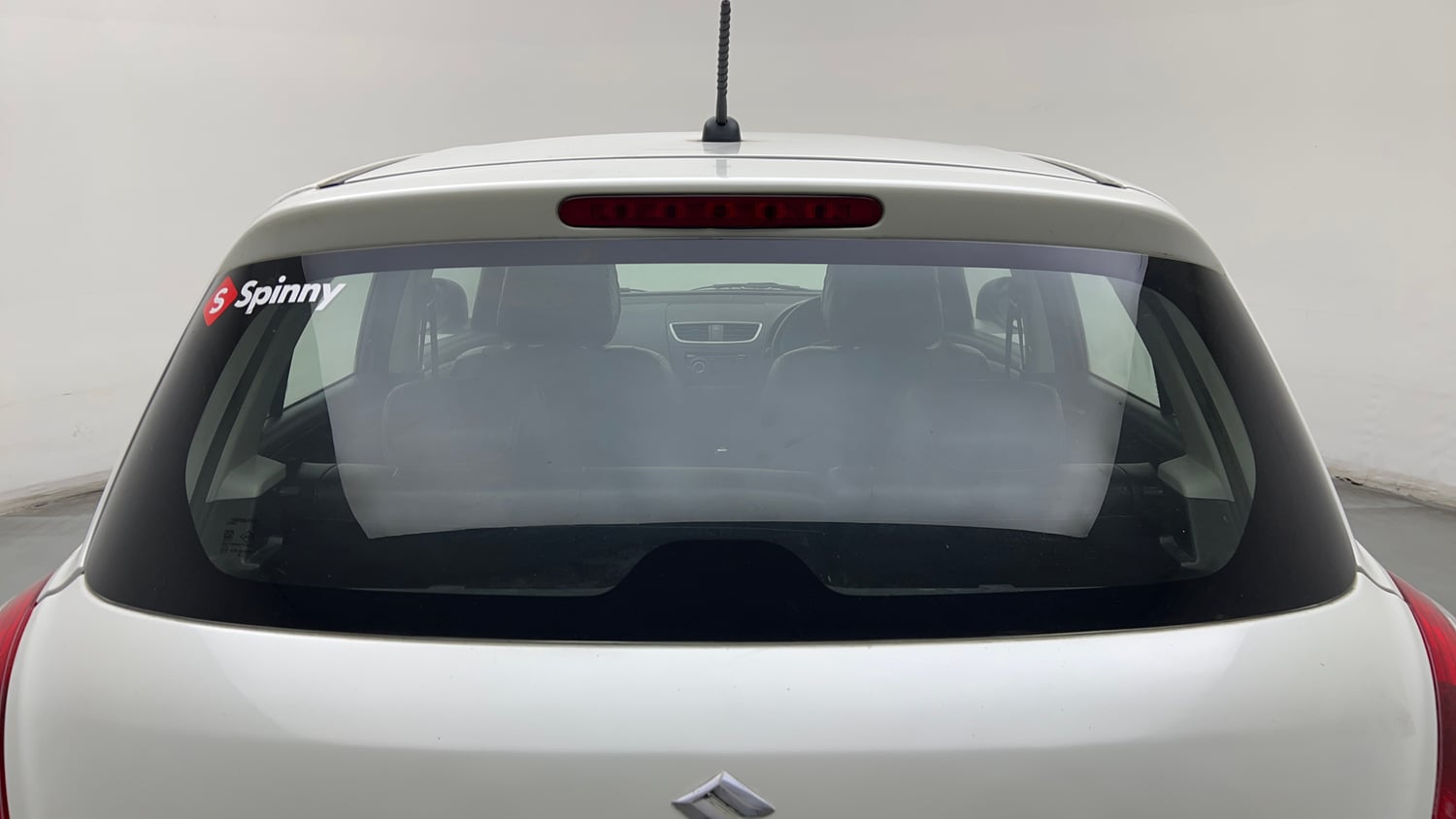 Used 2016 Maruti Suzuki Swift Lxi (O) Petrol Manual exterior BACK WINDSHIELD VIEW