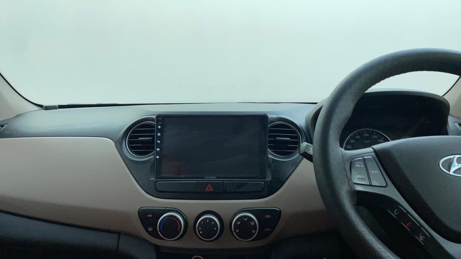 Used 2018 Hyundai Grand i10 Sportz AT 1.2 Kappa VTVT Petrol Automatic interior MUSIC SYSTEM & AC CONTROL VIEW