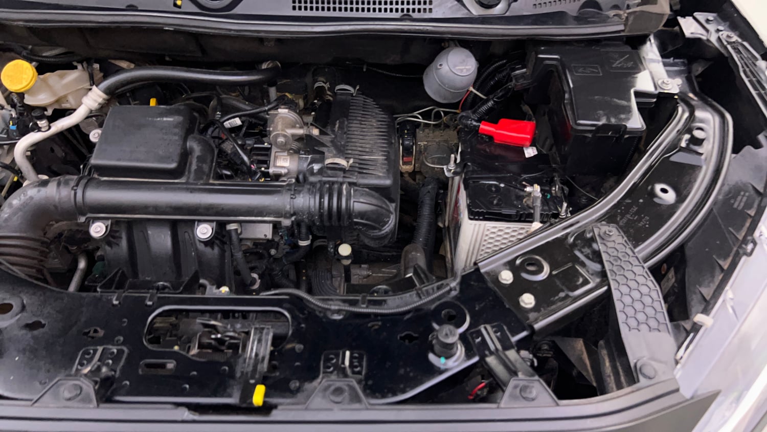 Used 2024 Nissan Magnite XE Petrol Manual engine ENGINE LEFT SIDE VIEW