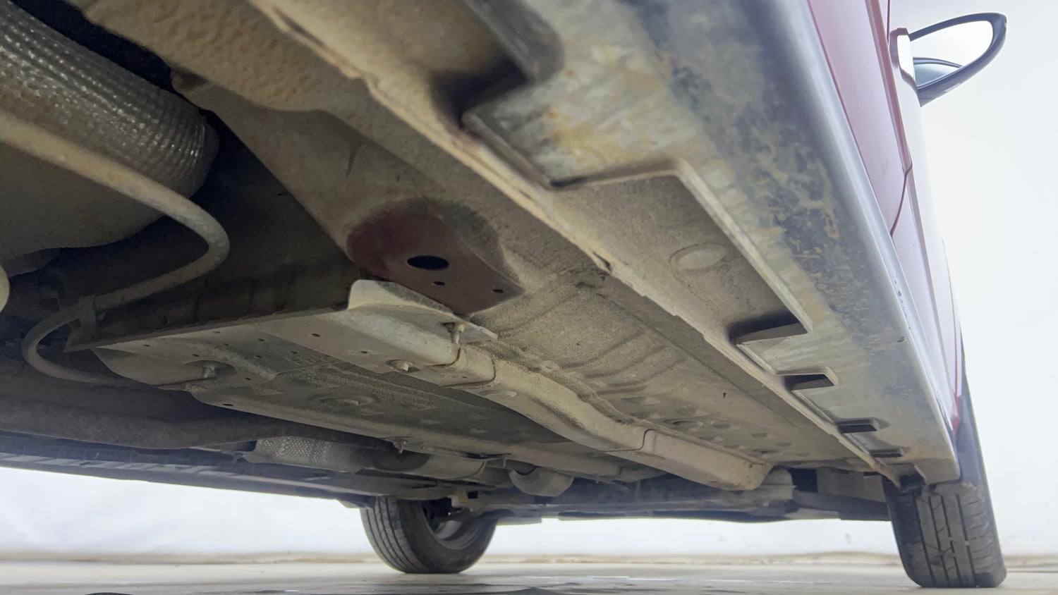 Used 2023 Hyundai New i20 Asta (O) 1.2 IVT Petrol Automatic extra REAR RIGHT UNDERBODY VIEW