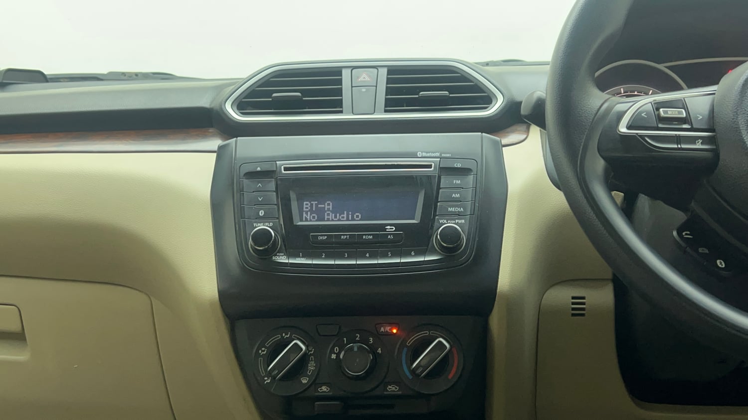 Used 2017 Maruti Suzuki Dzire VXi Petrol Manual top_features Integrated (in-dash) music system